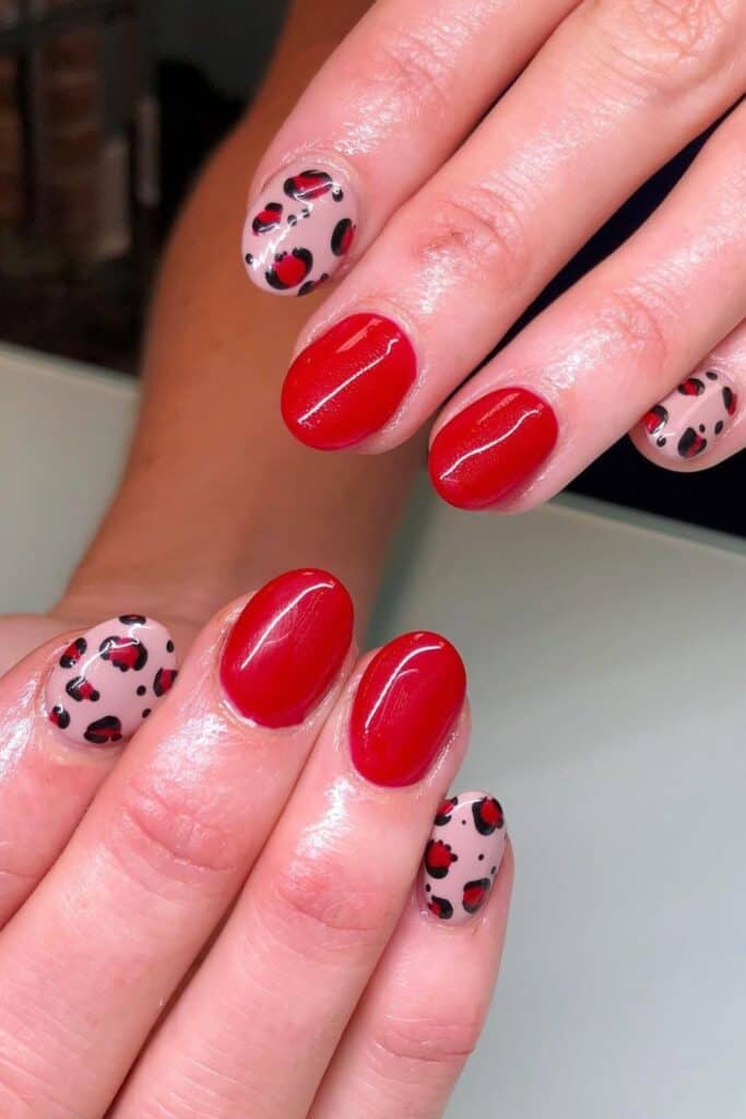 red cheetah print nails design