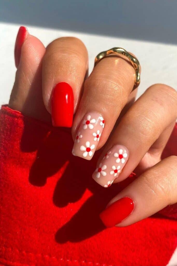 red nails white flower design